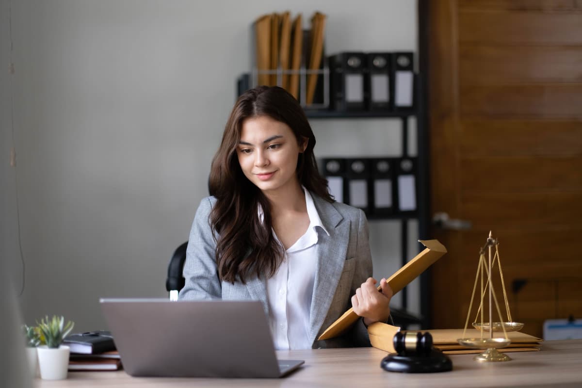 asian-lawyer-woman-working-with-a-laptop-computer